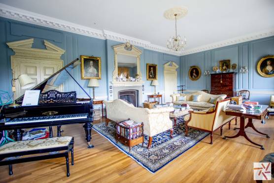 3219N 7 tv drama location house in north yorkshire elegant living room with piano.jpg