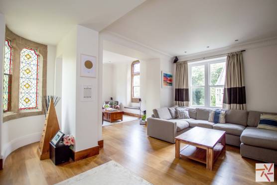 3248C 8 tv commercial location house in cheshire open plan living area with feature windows.jpg