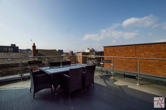 3260V 11 filming location in Liverpool rooftop terrace with urban and city centre views.jpg