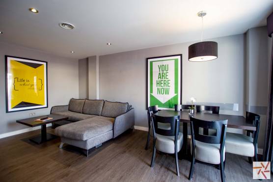 3260V 3 tv commercial location in Merseyside open plan living and dining area in an apartment hotel.jpg
