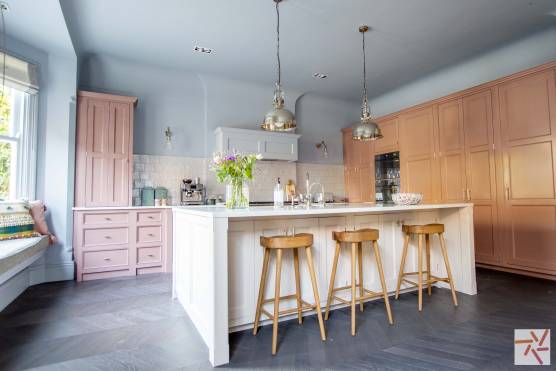 3253L 2 filming location house in Lancashire stylish open plan pink kitchen with kitchen island.jpg