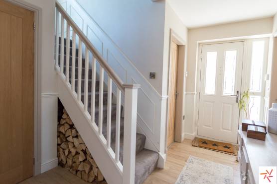 3284M 8 filming location house in Manchester white walled entrance area with staircase