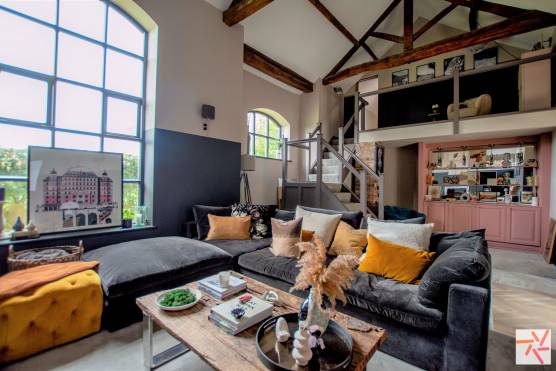 3291N 17 tv commercial location house in York stylish open plan living area with high ceiling and exposed beams.jpg