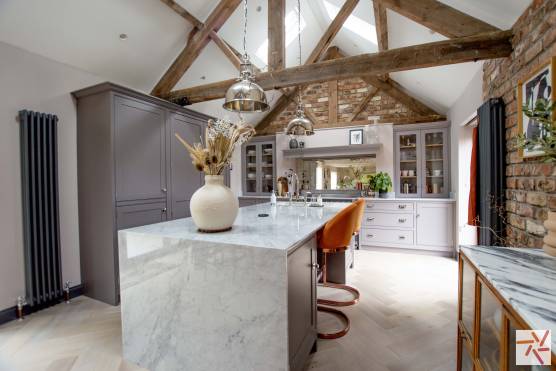 3291N 9 filming location house in York exposed brick and beams stylish kitchen.jpg
