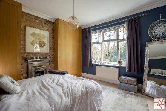 3333M 12 filming location house in Manchester large bedroom with fireplace