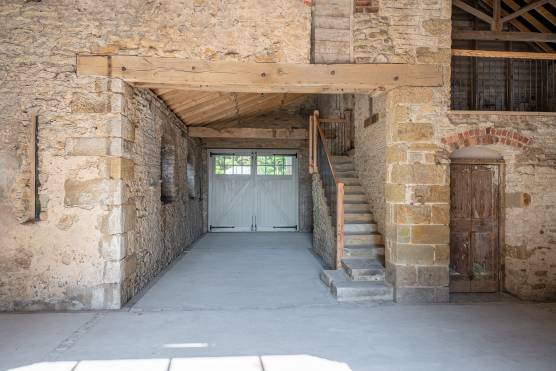 3416N 7 filming location house in North Yorkshire exposed brick barn with staricase.jpg