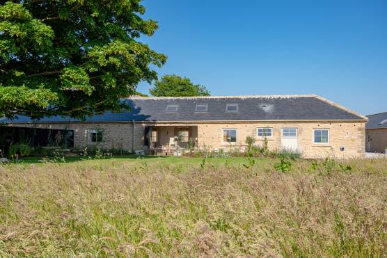 3419N 27 filming location house in North Yorkshire Scandi-style open plan barn conversion with patio area