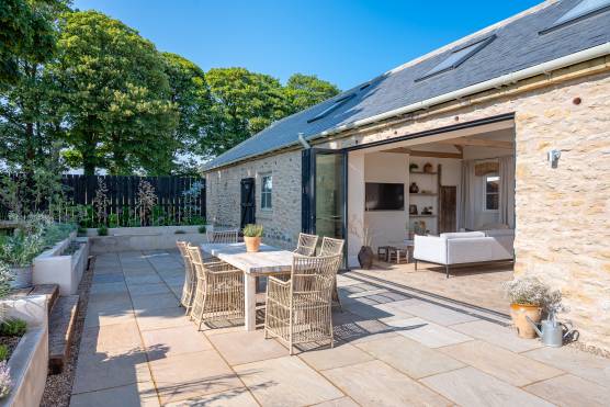 3419N 33 tv drama location house in North Yorkshire Scandi-style open plan barn conversion with patio area