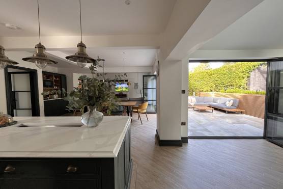 3436C 6 photo shoot location house in Cheshire stylish open plan green kitchen