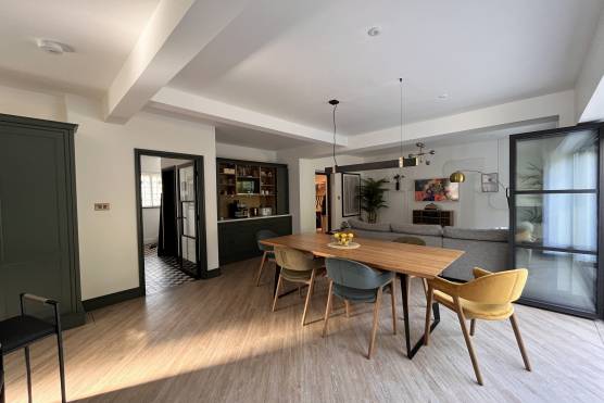 3436C 8 tv shoot location house in Cheshire stylish open plan green kitchen with bi fold doors