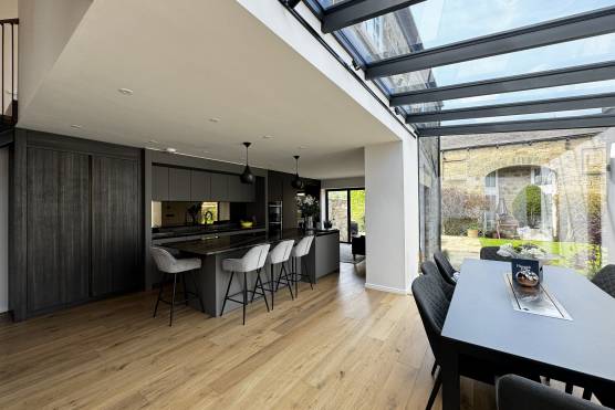 3470W 2 tv shoot location house in West Yorkshire with open plan dark kitchen