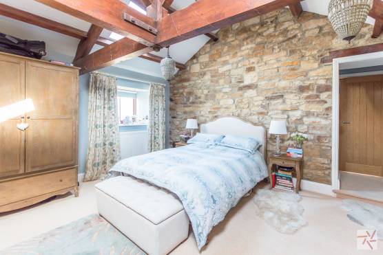 3134N 10 film location in north yorkshire exposed stone bedroom