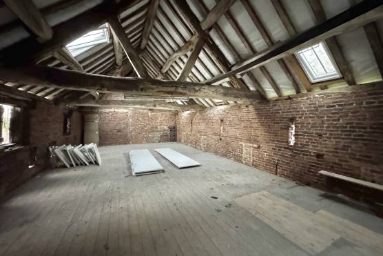 3519C 4 tv commercial location in Cheshire barn with exposed beams and brick.jpg