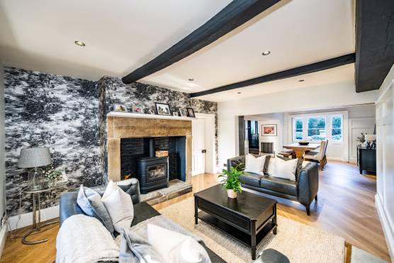 3526S 9 tv commercial location house traditional living room with exposed beams.jpg