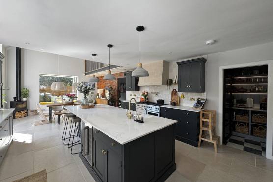 3533C 2 filming location house in Cheshire stylish open plan kitchen with kitchen island.jpg
