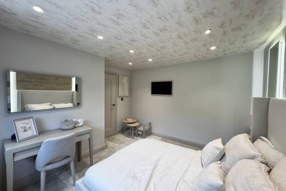3542W-27-filming-shoot-location-house-in-west-yorkshire-modern-bedroom-with-a-desk2.jpg