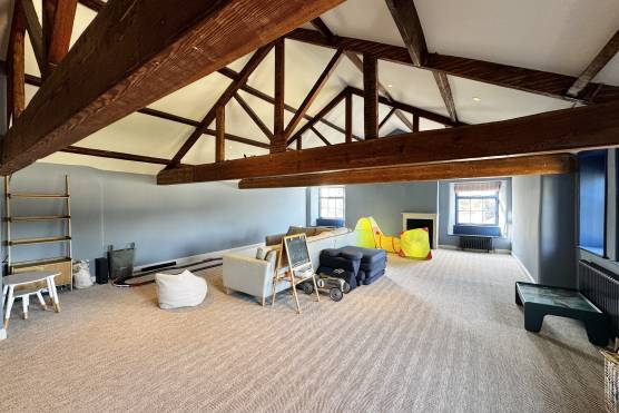 3545W 39 filming location house in West Yorkshire attic bedroom with wooden beams.jpg
