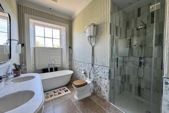 3545W 50 tv commercial location house in West Yorkshire bathroom with bath and shower.jpg