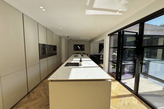 3546M 4 tv shoot location house in Manchester kitchen with kitchen island.jpg