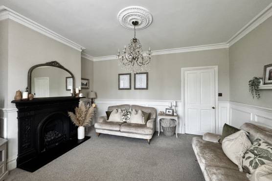 3553M 10 photo shoot location house in Manchester living room with fireplace.jpg