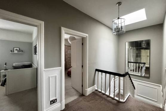 3553M 28 filming location house in Manchester staircase.jpg