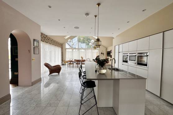 3556M 10 photo shoot location house in Manchester open plan white kitchen.jpg