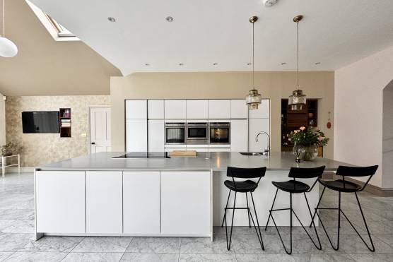 3556M 2 filming location house in Manchester modern open plan white kitchens.jpg