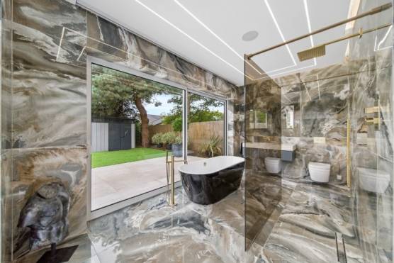 3558V-18-tv-shoot-location-house-in-Merseyside-luxury-marble-bathroom.jpg