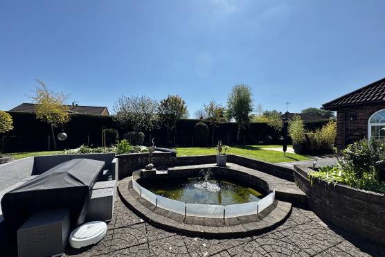 3563E 24 filming location house in east yorkshire garden with pond.jpg