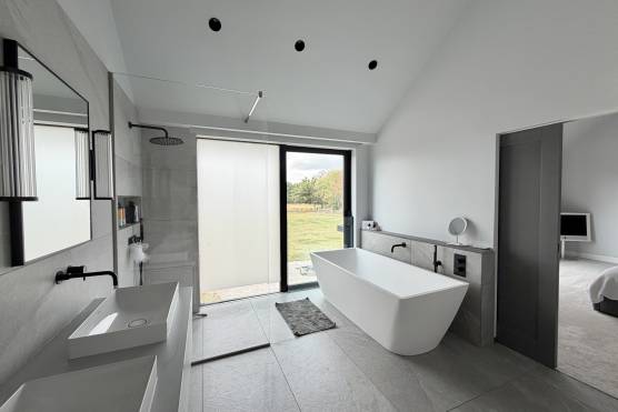 3572C 22 photo shoot location house in Cheshire contemporary bathroom with bath.jpg