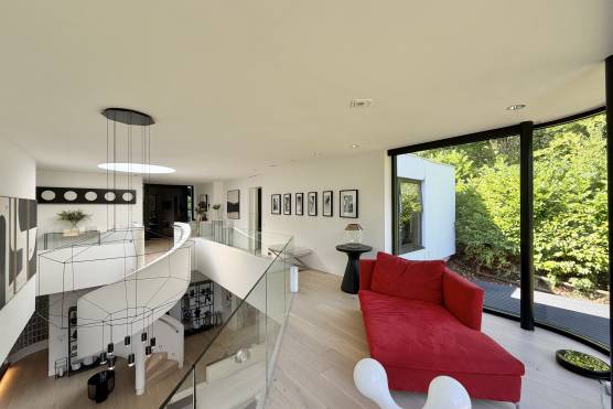 3574C 15 tv shoot lcoation house in Cheshire modern open plan living area with staircase.jpg