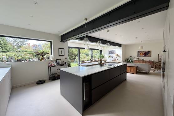 3580M 4 tv commercial location house in Manchester modern open plan kitchen with kitchen island.jpg