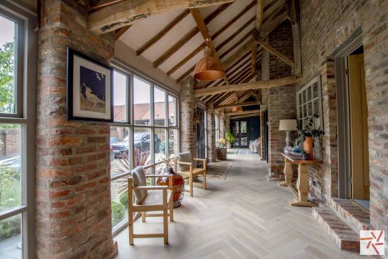 3291N-1-photo-shoot-location-house-in-North-Yorkshire-exposed-brick-hallway.jpg